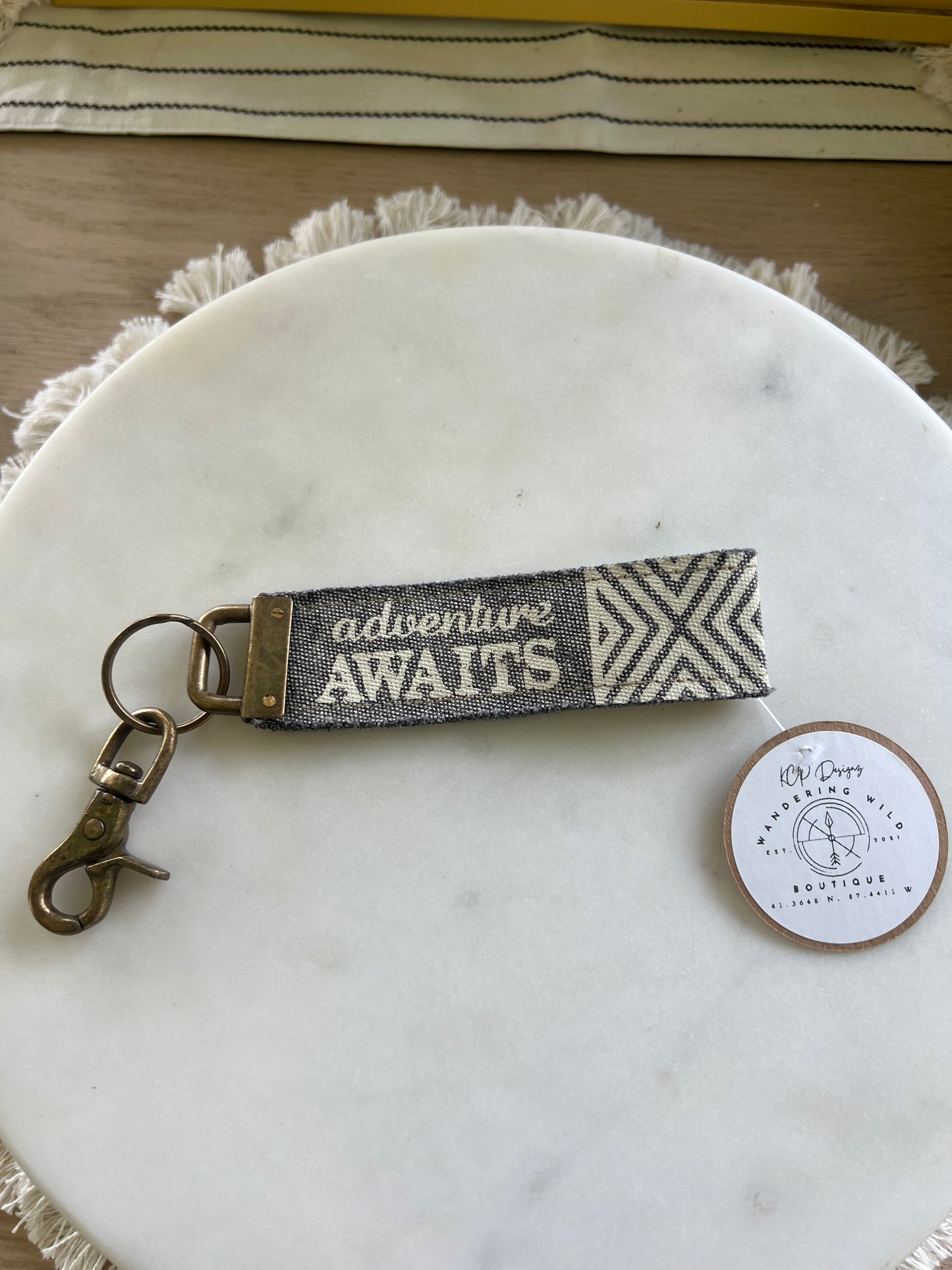 Adventure awaits keychain